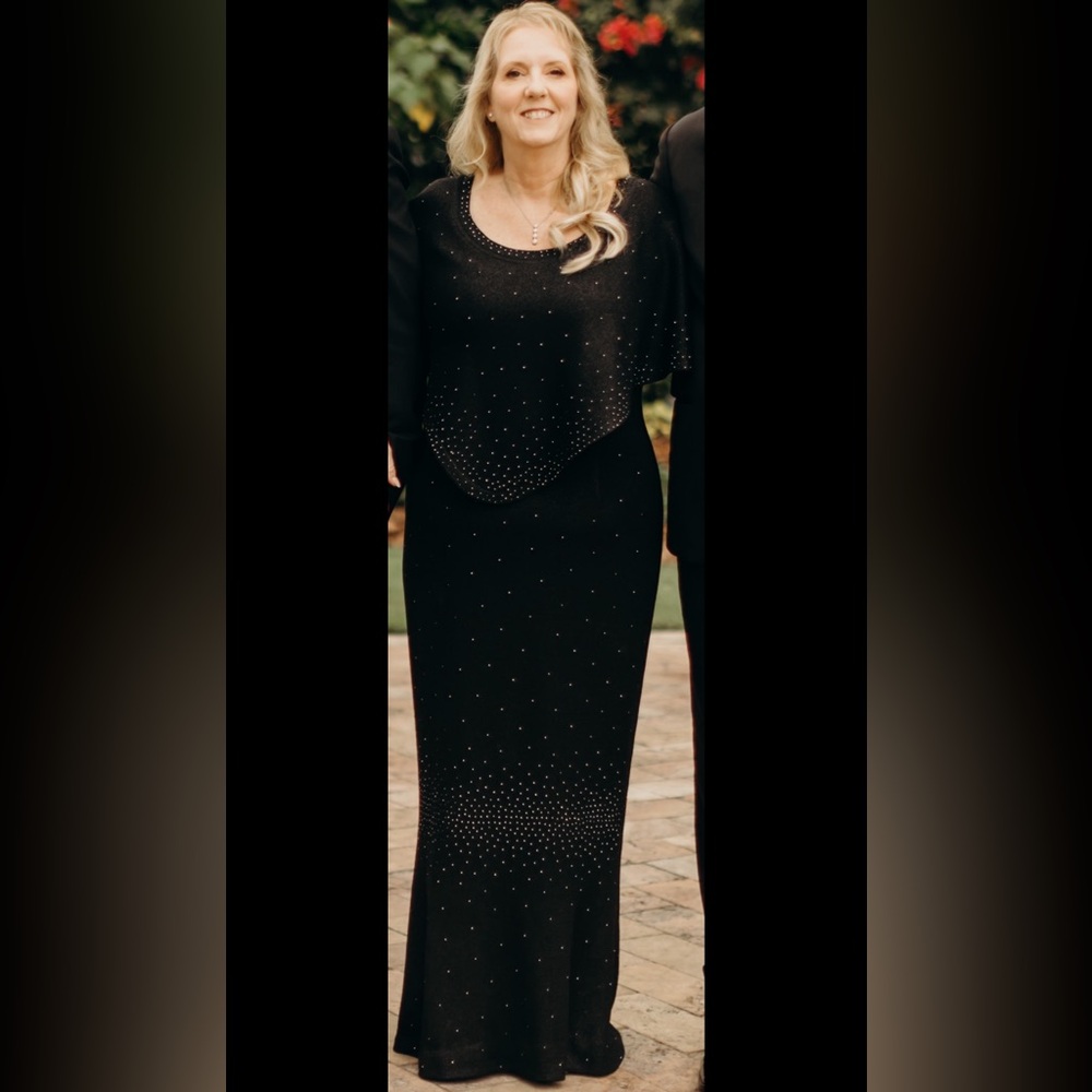 Beautiful Mother of the Bride Dress
XL
Black knitt
Like Brand new worn 2x
